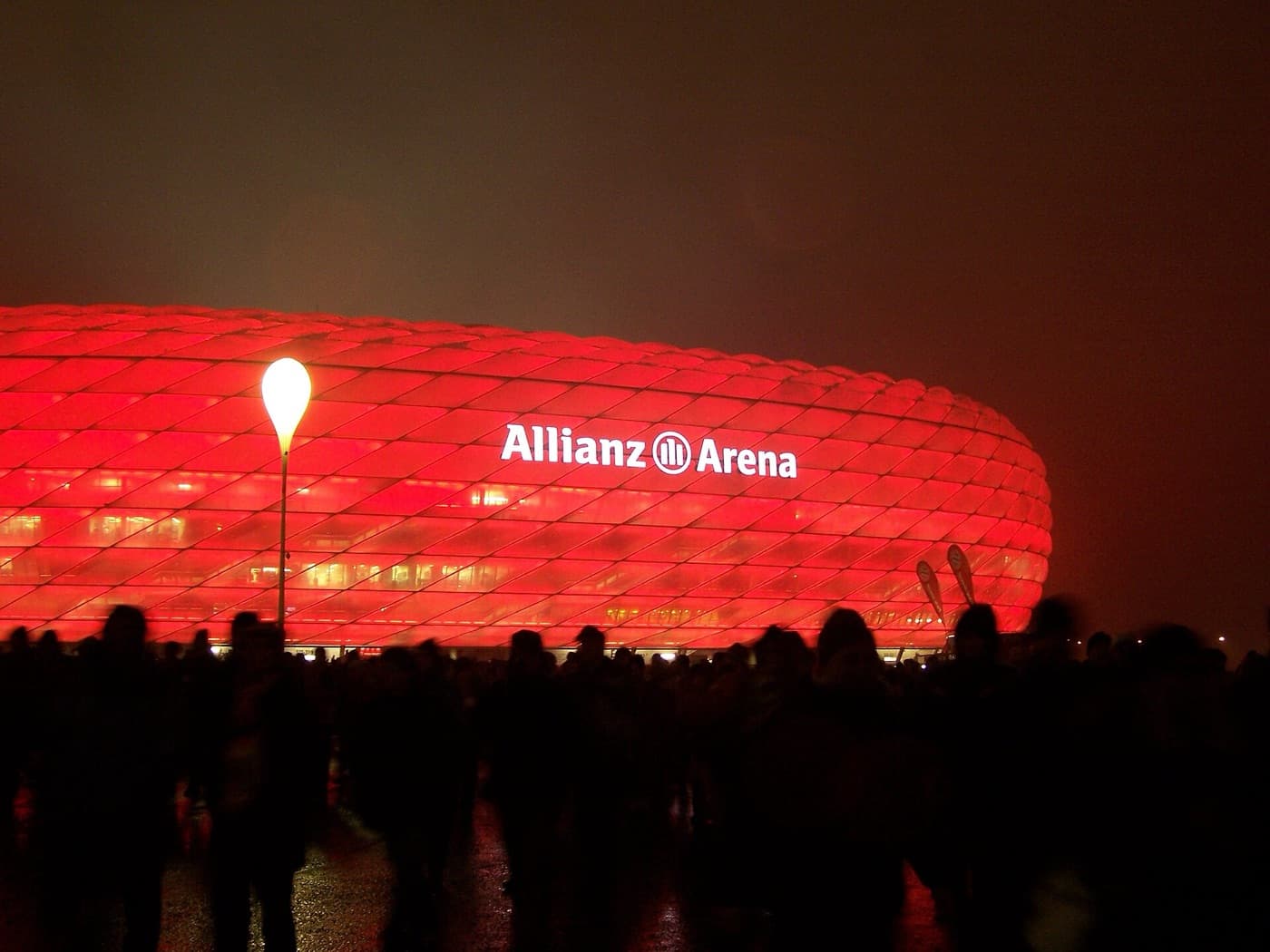 Allianz Arena lit red at night