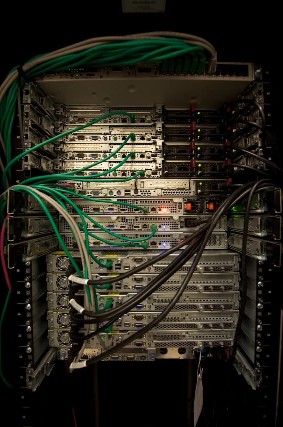 Rack of servers with network cables