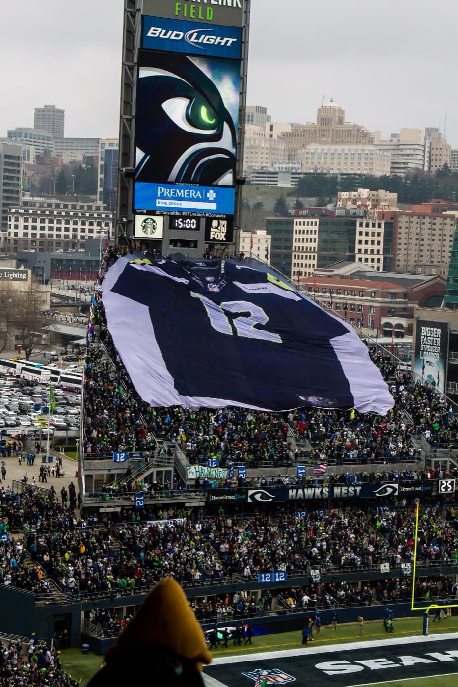 Seahawks fans unfurling a giant 12th Man jersey in the stadium